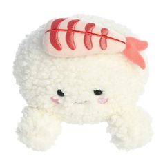 a white stuffed animal with a red fish on it's head and hair in the shape of a sushi