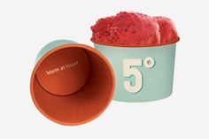 an ice cream in a cup with the number five on it next to another container