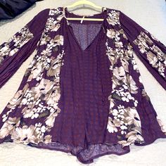 Nwot Fp Floral Purple Romper, Beautiful Colors. Oversized Fit. Length From Top Shoulder To Bottom Hem Is Approx 31 Inches. Chest & Waist Are Approx 25 Inches Across. Sleeve Length Is Approx 24 Inches. Inseam Is 2 Inches. Feel Free To Ask Questions, All Offers Welcome! Casual Purple Floral Print Jumpsuits And Rompers, Purple Jumpsuits And Rompers For Spring Loungewear, Spring Long Sleeve Purple Jumpsuits And Rompers, Purple Romper, Free People Pants, Floral Romper, Purple Floral, Oversized Fits, Pant Jumpsuit