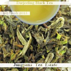 a cup filled with green tea next to a pile of dried leaves and the words darfeing black tea