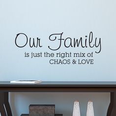 a wall decal that says our family is just the right mix of chaos and love