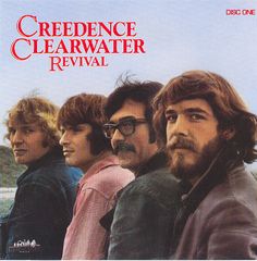 the album cover for creednce clearwater revival, featuring four men standing in front of water