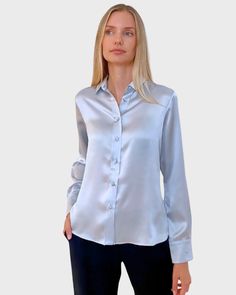 Elegant Light Blue Button-up Blouse, Fitted Silk Blue Shirt, Formal Light Blue Top With Spread Collar, Elegant Light Blue Blouse For Daywear, Blue Silk Button-up Top, Classic Blue Silk Blouse, Elegant Light Blue Office Shirt, Elegant Light Blue Collared Blouse, Elegant Light Blue Button-up Shirt