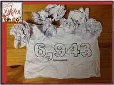 a white bag that has some tissue paper on it with the number 9443