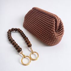 Brown Rectangular Pouch With Detachable Handle, Brown Pouch Clutch For Daily Use, Brown Rectangular Pouch For Personal Use, Handheld Brown Pouch For Daily Use, Brown Crochet Clutch Bag With Removable Pouch, Brown Handheld Clutch As Gift, Brown Handheld Clutch As A Gift, Handmade Handheld Pouch, Brown Handheld Mobile Phone Pouch