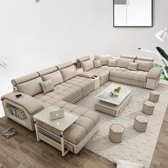 a living room with a large sectional couch and coffee table