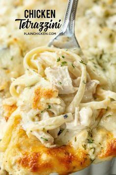 chicken tetrazzini in a white casserole dish with a fork