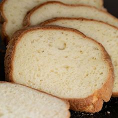 slices of white bread sitting on top of a table