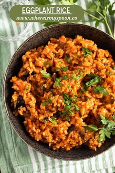 an eggplant rice in a bowl with parsley on top