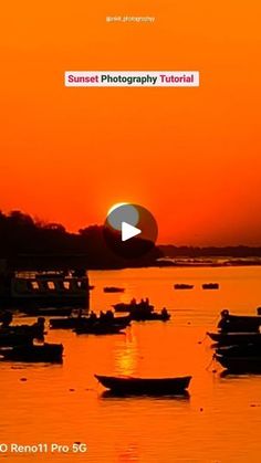 the sun is setting over boats in the water