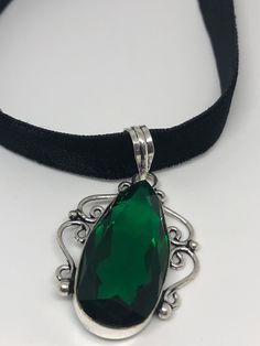 Very large ornate low content silver setting, Marker 925 but it is not. brilliant green emerald toned vintage glass About 2 inch long All jewelry is shipped in a nice gift box. Check out our over a THOUSAND great reviews Vintage Green Glass, Choker Pendant, Crystal Choker, Green Emerald, Glass Crystal, Green Glass, Crystal Glass, Emerald Green, Turquoise Bracelet