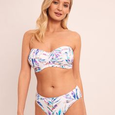 Are you looking to feel pretty in print this summer? The Fantasie Calypso Harbour Bandeau bikini offers the underwired D+ support you love with a sleek botanical design. 

•	Twist front gives a sweetheart neckline which is great if you like a little less coverage 
•	Lightly padded foam cups give support and a rounded shape
•	Lined with powernet at the back for added support and minimal movement 
•	Removable straps mean you have the option to avoid those pesky tan lines or add a little extra supp Supportive Swimsuit, Strapless Swimsuit, Botanical Design, Feel Pretty, Tan Lines, Twist Front, Relaxed Style, Sweetheart Neckline, This Summer