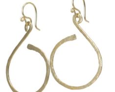 two pairs of earrings are shown with gold colored metal hoops on the ear wires