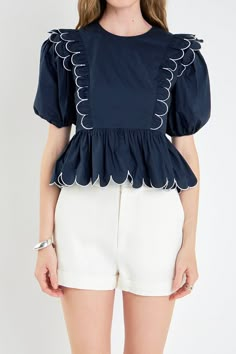 Add a touch of femininity to your everyday style. With its scallop edge details and round neckline, this top is perfect for giving your outfit a touch of girly flair. The ruffle shoulder and puff short sleeve also add some extra visual interest. Wear this top with jeans, skirts or pants for a look that's polished and stylish. Scallop edge details Round neckline Ruffle shoulder Puff short sleeve Peplum waist Center back invisible zipper closure Hand wash cold Do not bleach Do not tumble dry Iron low Shell: 100% Cotton Lining: 80% Polyester 20% Cotton Exclusive of Decoration Exclusive of Elastic JJ1764T Total length :21.50" Bust :34" S NAVY/WHITE: Height 5'10"(178cm) / Bust 34"(86cm) / Waist 24.5"(62cm) / Hip 34.5"(87cm) Large Collar Shirt, Short Sleeve Cotton Tops With Scalloped Edges, Cotton Short Sleeve Tops With Scalloped Edges, Cotton Tops With Scalloped Edges And Short Sleeves, Summer Tops With Scalloped Edges And Short Sleeves, Summer Blouse With Scalloped Edges And Short Sleeves, Spring Short Sleeve Tops With Scalloped Edges, Spring Tops With Scalloped Edges And Short Sleeves, Scalloped Edges Short Sleeve Tops For Spring