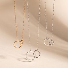 14K or 18K Real Gold Interlocking Circles Necklace * Solid Gold linked Dainty Ring Necklace * Entwined Circles Necklace * Double Hoop Rings Necklace for Her ✅Gold Material: Real gold, genuine solid gold ✅Gold karat options: 14k or 18k gold ✅Gold color options: Yellow Gold, Rose Gold, and White Gold 📐DIMENSIONS Small Charm Necklace: small    * Twisted ring diameter: 9.0mm    * Plain ring diameter: 6.0mm Medium Charm Necklace: small    * Twisted ring diameter: 12.0mm    * Plain ring diameter: 9.0 Tarnish Resistant Hoop Necklace, 14k Gold Hoop Necklaces For Gifts, Elegant 14k Gold Hoop Necklace, Elegant Sterling Silver Hoop Necklace, Gold Hoop Sterling Silver Necklace, Sterling Silver Hoop Necklaces In Gold Color, Gold Hoop Sterling Silver Necklaces, Gold Sterling Silver Hoop Necklaces, Sterling Silver Hoop Necklace In Yellow Gold