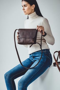 ◈Ladies' messenger OldTownLeather will become your favorite little handbag. ◈The long shoulder strap makes it discreet and lightweight. Minimalistic design, small size, easy to use, large selection of colors, one large compartment inside and a pocket for your phone and small belongings. ◈While placing an order in our store, you can specify in the message the length of the shoulder strap that suits you. Changing the length of the strap does not affect the price of the bag. In your purse, you can Everyday Brown Crossbody Satchel, Daily Brown Crossbody Satchel, Woman Bag, Chocolate Leather, Gorgeous Leather, Mini Tote Bag, Minimalistic Design, Yellow Leather, Mini Shoulder Bag