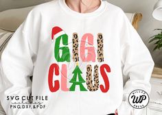 a woman wearing a white sweatshirt with leopard print on the front and green letters that read mmm class