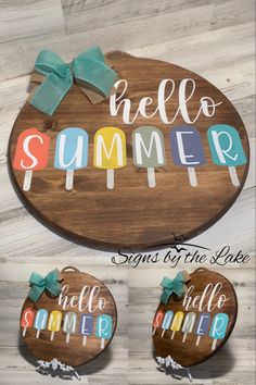 three wooden signs with the words hello summer painted on them, and one saying hello summer