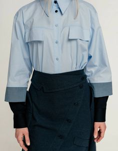 A shirt of a flat silhouette, made of shirt poplin. Shirt collar, button closure. Long sleeve with double cuffs. Rounded bottom of the product.Product parameters:Back length 75 cm/ 30inSleeve length 57 cm/ 22,5 inModel's height: 174 cmSeason: Spring / Summer / AutumnCare instructions: Machine wash 30°C. Spin 600-800 rpm. Do not tumble dry. Do not use chlorine bleaches or stain removers. Ironing: high temperature, seamy side. We recommend using a starching agent.Composition: 98% Cotton 2% Elastan Stain Removers, Double Cuff, Poplin Shirt, Shirt Collar, Fast Fashion, High Temperature, Workout Shirts, Fashion Models, Night Out