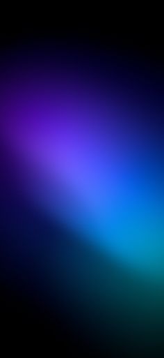 a blurry image of blue and purple colors