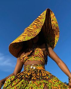 "Keep it cute and chic in our \" Massive Oversized Floppy Kente Print Sun Hat\" this season. This is a one size fits all, lightweight, durable and uniquely sewn hat made from high quality African Ankara print. This hat may help keep your face shaded from the sun as you embark on a full day outdoors and it is sure to turn heads wherever you choose to wear it to. The possibilities are endless with this beautiful well constructed hat! It's the perfect look for your summer vacation, baecation, weeke Fitted Fedora Sun Hat For The Beach, Fitted Wide Brim Sun Hat For Vacation, Fitted Sun Hat With Curved Brim For Beach, Fitted Beach Sun Hat With Curved Brim, Fitted Summer Hats For Beach, Fitted Bohemian Summer Hats, Fitted Green Sun Hat For The Beach, Fitted Sun Hat For Beach Vacation, Bohemian Fitted Straw Hat For Vacation