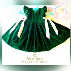 This is a beautiful kids Frock Made of Velvet Fabric Cute Green Holiday Dress, Fitted Green Princess Dress For Holiday, Green Christmas Princess Dress With Ruffles, Fitted Green Princess Dress For Festive Occasions, Cute Green Dress For Festive Occasions, Cute Green Dresses For Festive Occasions, Cute Green Festive Dress, Festive Green Dress, Festive Fitted Green Holiday Dress