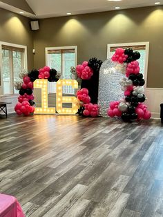 an image of a dance floor decorated with balloons and letters that spell out the word love