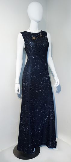 This woman makes amazing clothing themed from STEM. What great designs too! Constellation Maxi Gala Dress Fantasy Dress Queens Goddesses, Fantasy Dress Queens, Constellation Dress, Starry Night Dress, Celestial Dress, Nasa Clothes, Custom Jewelry Ideas, Women In Stem, Space Dress