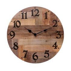 a clock made out of wood with numbers on the face and hands, sitting in front of a white background