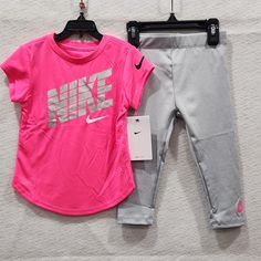 Nwt Bin Sn.R Playful Pink Activewear For Spring, Pink Cotton Activewear For Playwear, Pink Short Sleeve Sports Set, Nike Pink Short Sleeve Sets, Playful Pink Nike Sets, Pink Nike Cotton Activewear, Nike Pre-shrunk Graphic Tee, Toddler Girl Nike Socks, Nike Suit