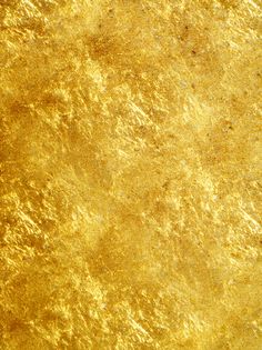 an abstract gold background with some light reflections