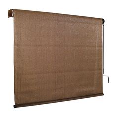 a brown curtain hanging on the side of a wall with an iron bar in front of it