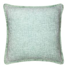 a light green pillow on a white background