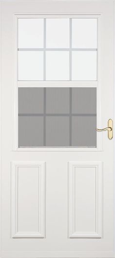 a white front door with two windows and a metal handle on the bottom part of the door