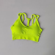 SPECIFICATIONSBrand Name: NoEnName_NullSports Type: YogaMaterial: Nylon spandexOrigin: Mainland ChinaCN: ZhejiangDepartment Name: WomenFeature: Quick DryModel Number: WX850Closure Type: No buckleChoice: yessemi_Choice: yes Seamless Sleeveless Green Sports Bra, Solid Crop Top With Light Support For Sports, Green Sleeveless Seamless Sports Bra, Breathable High Stretch Sports Crop Top, Breathable Solid Crop Top For Yoga, Breathable Crop Top For Yoga, Breathable Solid Color Crop Top For Yoga, Green Moisture-wicking Crop Top For Workout, Seamless Stretch Tank Top For Sports