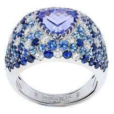 Tanzanite 2.80 Carat Diamonds Blue Sapphires White 18 Karat Gold Riviera Ring The name and the variety of colours in this collection are associated with the bright Italian and French Riviera, vivid and colourful houses and sun reflections on the water. A place where grow cypresses, palm trees and chestnuts, where there are many gardens, parks and vineyards. Many works by Auguste Renoir, Henri Matisse, Paul Signac were made in these places. Inspired by these beauties, we present you the Riviera c Paul Signac, Zipper Jewelry, Auguste Renoir, Diamond Fashion Rings, Pink Bracelet, Henri Matisse, Cocktail Rings, Tanzania, Amazing Jewelry