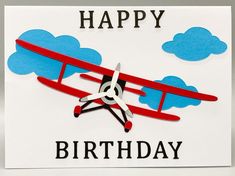 a birthday card with an airplane and clouds