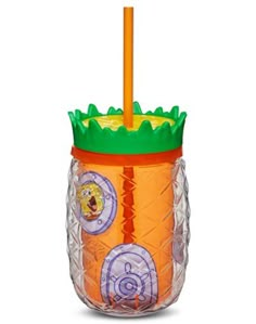 an orange and green cup with a straw sticking out of it's top, on a white background