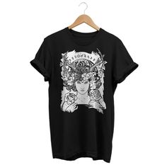 "This is a occult horoscope t-shirt for a mystic witchy style. This cool zodiac shirt is perfect for modern witches and wizards, and priestess of the sacred feminine, Wicca and pagan cults. This tee is a perfect witch gift for witchy women, powerful women, witchy teen girls, teen boys, goth people. . Do you prefer a different color print or color t-shirt? No problem, send me a message with your request so i can confirm and print it as YOU like. Do you want one of the prints on hoodies, kids size Graphic Tee For Alternative Fashion, Alternative Fashion Graphic Print T-shirt, Alternative Fashion Graphic Tee With Graphic Print, Graphic Tee T-shirt For Alternative Fashion, Artistic Graphic Print Top As A Gift, Artistic Graphic Print Top As Gift, Artistic Graphic Print Tops As Gift, Alternative Fashion Graphic Print Tee, Graphic Tee With Alternative Fashion Design