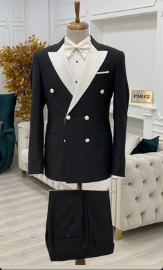 Fitted Pantsuit With Button Closure For Semi-formal Occasions, Elegant Black Suit With Double-breasted Button Fastening, Slim Fit Long Sleeve Suits With Buttons, Office Tuxedo With Double Button Closure And Long Sleeves, Party Suits With Lapel Collar And Button Closure, Party Suits With Button Closure And Lapel Collar, Slim Fit Long Sleeve Suit With Double Button Closure, Black Double-breasted Tuxedo For Office, Fitted Double Breasted Suit With Buttons For Party