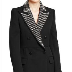 Black Embellished Blazer From Givenchy Featuring A Notched Collar With Silver-Toned Crystal Beading, Structured Shoulders, Long Sleeves, A Double-Breasted Design And Front Flap Pockets. For An Edgy Evening Look, Pair It With Leather Trousers, Pointed Ankle Boots And An Embellished Clutch. Composition: 80% Wool, 20% Silk Care: Dry Clean Only Luxury Embellished Outerwear For Work, Luxury Embellished Workwear Outerwear, Tailored Embellished Outerwear For Work, Elegant Outerwear With Embellished Collar For Work, Chic Long Sleeve Outerwear With Embellished Collar, Chic Tailored Embellished Outerwear, Fitted Outerwear With Embellished Collar For Work, Chic Embellished Outerwear For Work, Female Tux