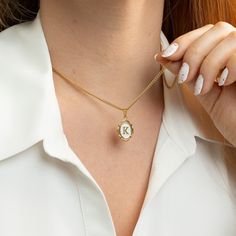 "Oval Initial Necklace  Always carry your loved ones close to your heart ♡ * High-Quality 316L Stainless Steel * Gold Our Products are different from regular gold plating because it is a THICK layer (x10 times more) of 18k solid gold on stainless steel, making it more durable. Size Specs: * Initial Pendant Dimensions: 11mm x 14mm * Necklace will come with a 2\" extension chain so you can FINE TUNE the fit. If you don't want, please contact us. Features: * Waterproof / Hypoallergenic / 100% lead Personalized Oval Gold Necklaces, Personalized Gold Oval Necklace, Personalized Oval Gold Necklace, Personalized Gold Locket Necklace For Mom, Oval Charm Necklaces For Gifts, Oval Charm Necklaces As Gift, Gold Oval Necklace With Initials, White Initials Necklace For Valentine's Day, Oval Charms Necklace For Gift