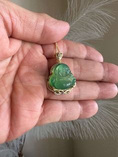 Gorgeous Genuine green jade Buddha Pendant with gold-plated necklace  Good Fortune Good Luck Peace and Joy These are 100% Real Natural Untreated Nephrite Grade A Jade from Taiwan.   Wear these 'Stone of Heaven' to bring Wealth, Luck and Good Fortune while Protecting yourself and your loved ones from negative energy.   * Brings Good Luck Fortune Wealth and Peace * ATTRACTS positive energy of nature to your life * Makes you feel better * Calms the soul while uplifting your heart * Instills feeling Luxury Jade Necklaces For Meditation, Spiritual Jade Necklace Gift, Green Buddha Necklace, Green Jade Buddha Necklace, Jade Buddha, Collectible Jade Pendant Jewelry, Buddha Pendant Necklace, Healthy Gift, Pendant Necklace Gold