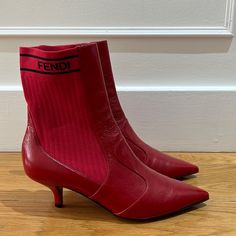 Never Worn Fendi Red Leather Ankle Boots With Elasticated Ankle, Low Heel, Very Comfortable Size - 37 Color - Red. Fall Boots With Red Sole In Calf Leather, Fall Calf Leather Boots With Red Sole, Luxury Red Heeled Boots For Fall, Designer Ankle-high Heeled Boots For Winter, Luxury Red Boots For Fall, Designer Red Pointed Toe Boots, Designer Red Boots With Pointed Toe, Luxury Red Pointed Toe Heeled Boots, Luxury Boots With Red Sole For Fall