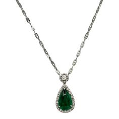 This is part of Chairish’s Fine Jewelry assortment.  Gorgeous 3.35 ct. emerald cabochon pear shape with 0.25 ct. good quality white diamond rounds.  Handmade in 18k white gold. Pear-shaped Emerald Gemstone Necklace For Formal Events, Pear-shaped Emerald Gemstone Necklace For Formal Occasions, Elegant Pear-shaped Emerald Necklace For Formal Occasions, Elegant Formal Pear-shaped Emerald Necklace, Formal Pear-shaped Emerald Necklace In Fine Jewelry Style, Luxury Pear-shaped Emerald Necklace With Diamonds, Luxury Pear-shaped Diamond Emerald Necklace, Formal Pear-shaped Emerald Necklace Fine Jewelry, Formal Pear-shaped Emerald Necklace