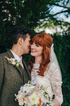 a bride and groom are posing for a photo