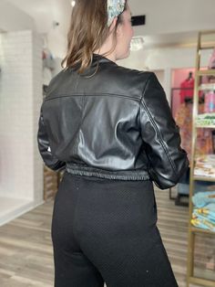 Make a statement no matter the season with the Zoe Cropped Bomber jacket. This classic faux leather, cropped jacket gives an edgy yet sophisticated style that will rock and roll every outfit. Fitted Leather Cropped Jacket, Black Cropped Leather Biker Jacket, Fitted Leather Cropped Jacket In Edgy Style, Chic Fitted Faux Leather Biker Jacket, Trendy Cropped Jacket For Party, Trendy Faux Leather Outerwear For Night Out, Trendy Cropped Leather Jacket With Zipper, Trendy Cropped Leather Jacket For Work, Fitted Casual Cropped Leather Jacket