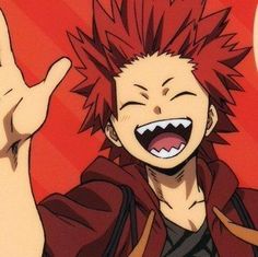 an anime character with red hair is making the peace sign and holding his hand up in front of him