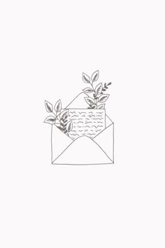 an envelope with plants growing out of it