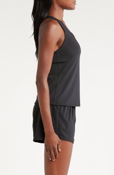 A built-in shelf-bra keeps you supported in this racerback tank top cut with signature Dri-FIT technology for cool, dry comfort as you work up a sweat. 20 1/2" length (size medium) Scoop neck Racerback Built-in shelf-bra Dri-FIT moisture-wicking technology 82% polyester, 18% spandex Machine wash, line dry Imported Built In Shelves, Shelf Bra, Racerback Tank Top, Nike Dri Fit, Racerback Tank, Dri Fit, Moisture Wicking, Scoop Neck, Built In